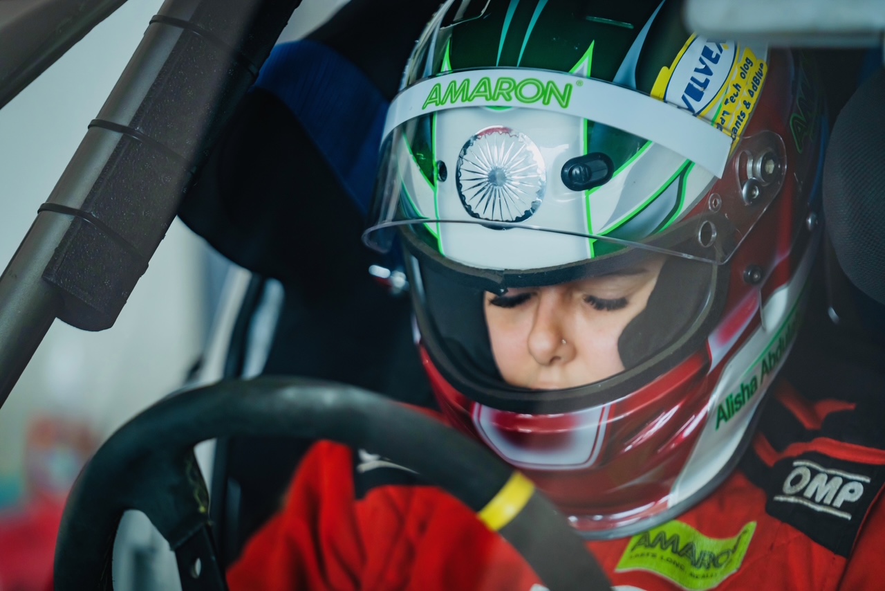 Alisha focused in the cockpit